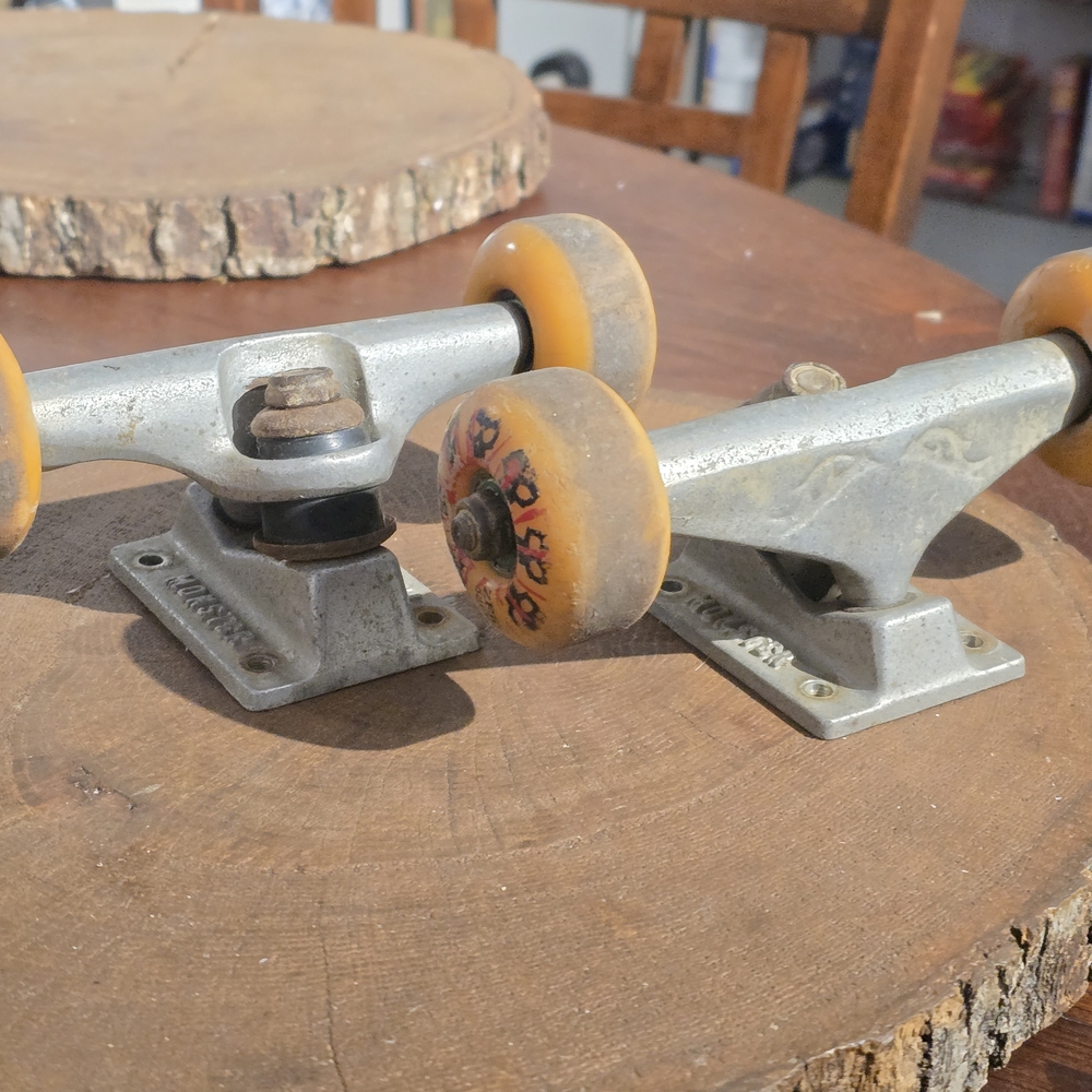 Skateboard Trucks with Orange Wheels